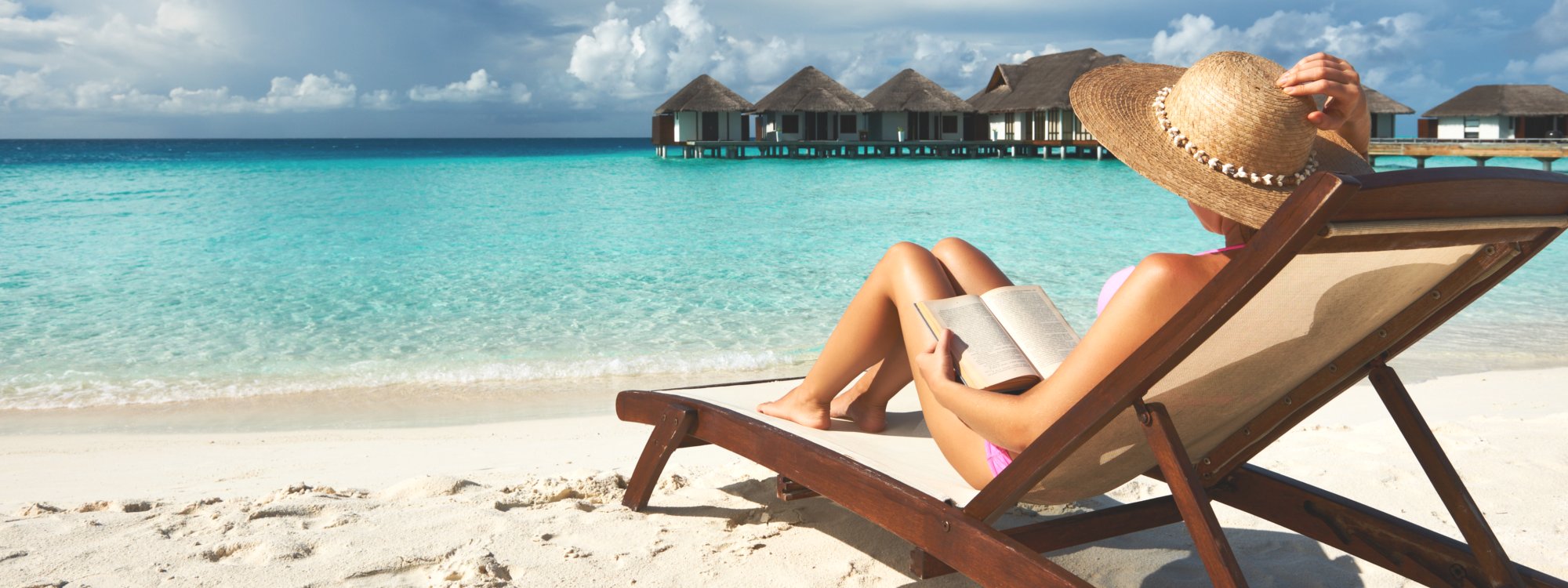 Woman enjoying her time on a beach.